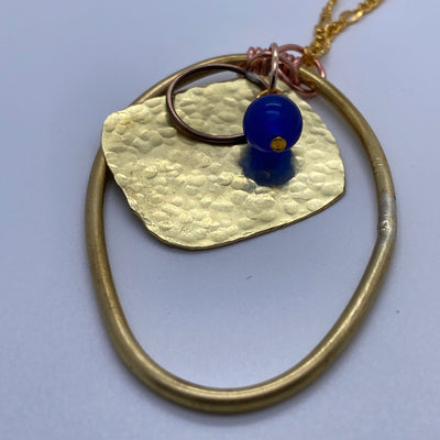 Blue calchedony on brass oval, circle and hammered square