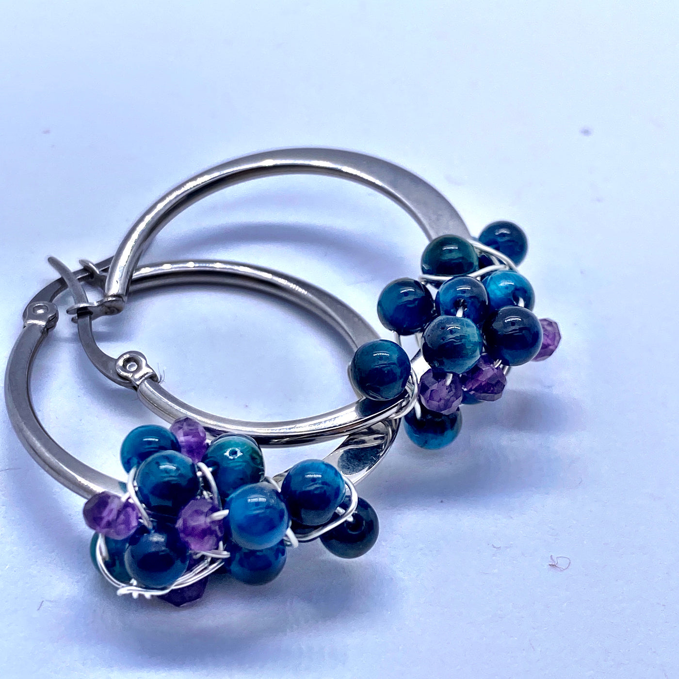 Round silver sterling earring with blue tiger eye and amethysts