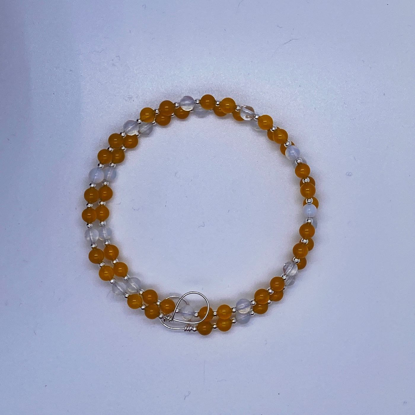 Yellow agate and opalite 4 mm small pearls bracelet.