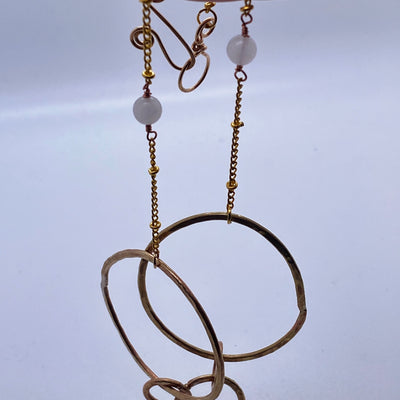 Brass circle texturized necklace on chain with rose quartz