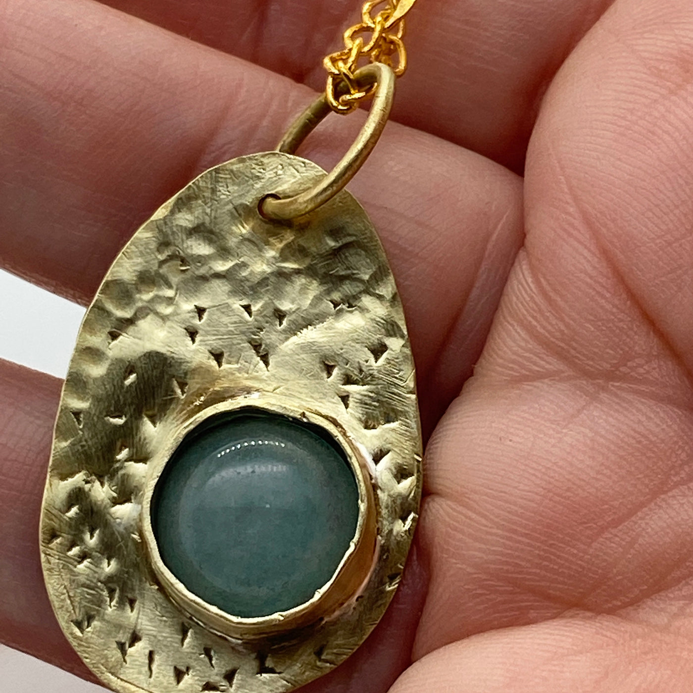 Brass pendants with cabochon stone
