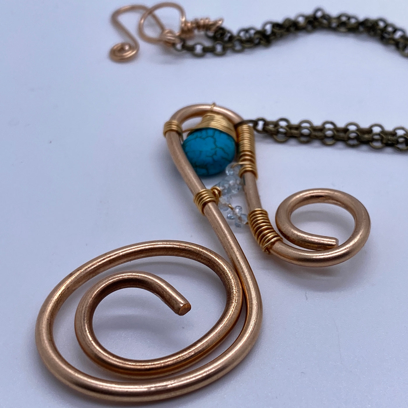 Large bronze wire and turquoise pendant