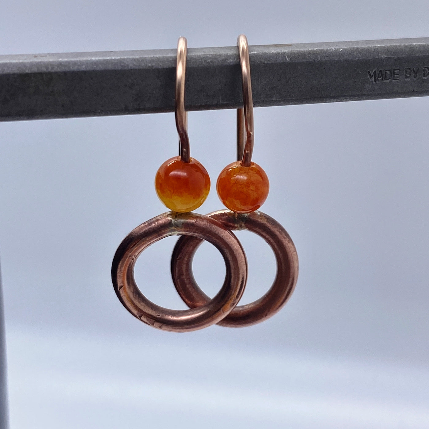 O brass and orange giada pearls earrings