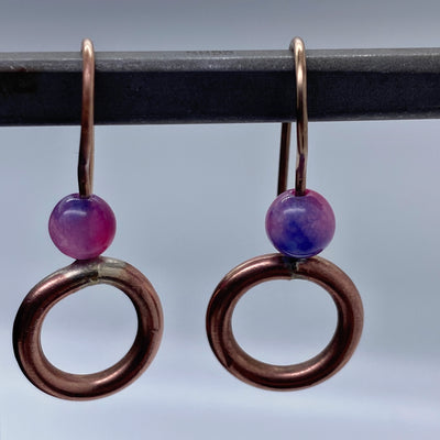 O brass and purple pearls earrings