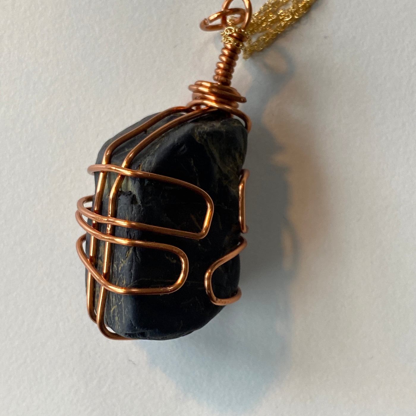 Black natural stone on wire pendant. Gorgeous stone.