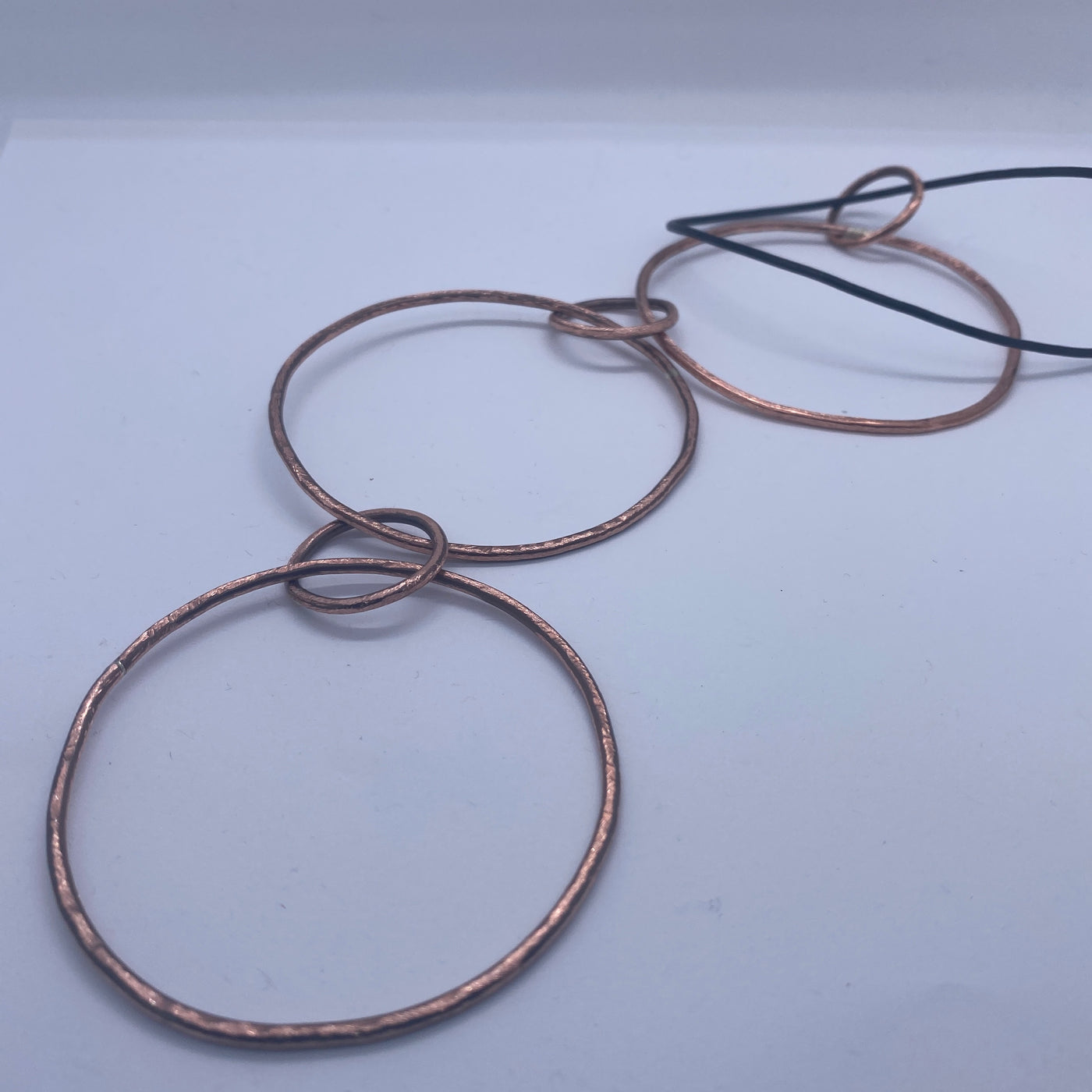 Bronze 6 round circles pendant attached to leather cord