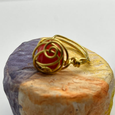 Striped tangle -brass ring with striped orange-rose cabochone size N