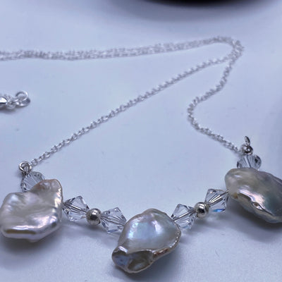 Baroque swarosky necklace 2. Baroque flat freshwater pearls and swarosky crystals on silver chain. 