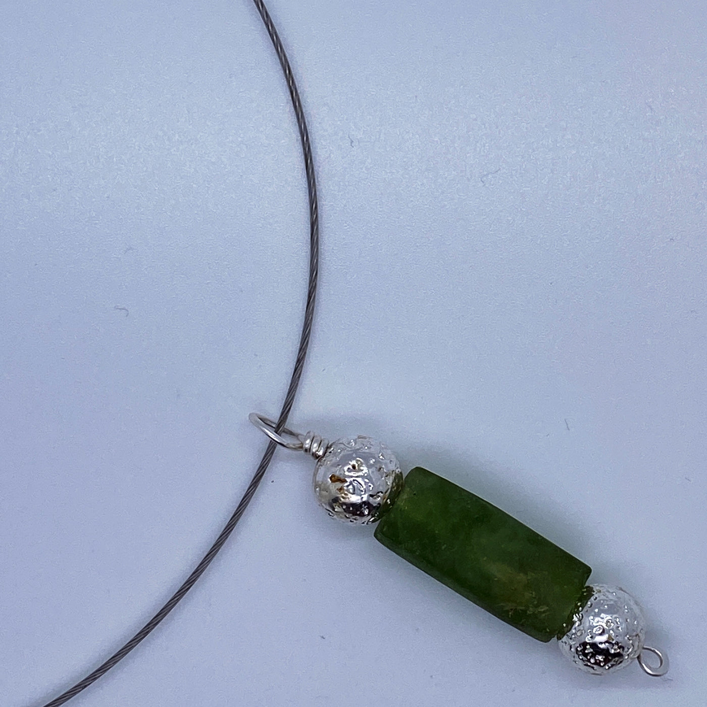 Silver necklace and lava stone silver plated pearls and green glass pendant